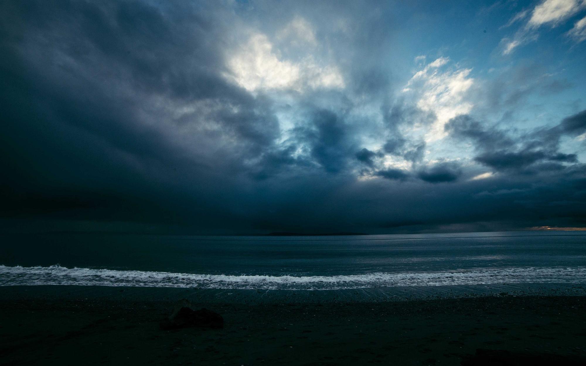 The sea at dusk, seen from the high coast